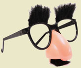 pair of Groucho Marx glasses, complete with bushy eyebrows and mustache